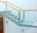 Стеклянные ступени и стеклянная площадка на лестнице в Волгограде. Готовые проекты ПерилаГлавСнаб - фото 1