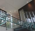 Стеклянные полы на площадке маршевой лестницы в Волгограде. Готовые проекты ПерилаГлавСнаб - фото 1